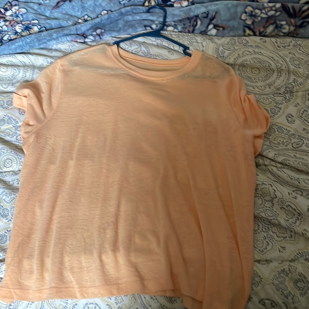 A new day orange tee
